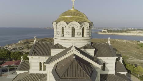 aerial view of a beautiful orthodox church with sea view