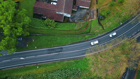 top view cars riding countryside terrain. asphalt roadway hurrying transport