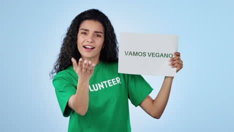 Volunteer-woman,-vegan-sign