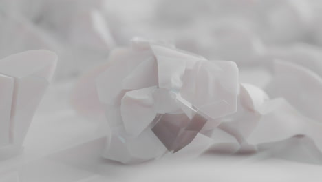 crushed android shells on spikes on a foggy, white junkyard