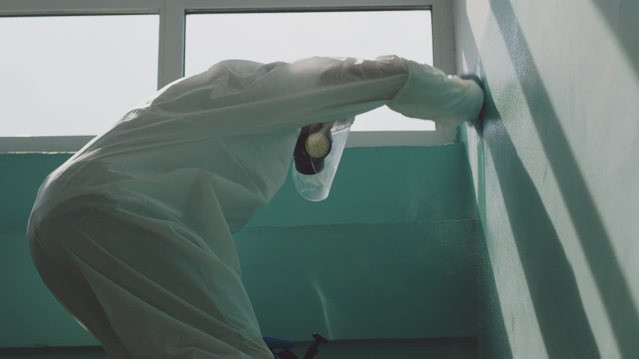 Disinfection and Sanitization with Hazmat Suit