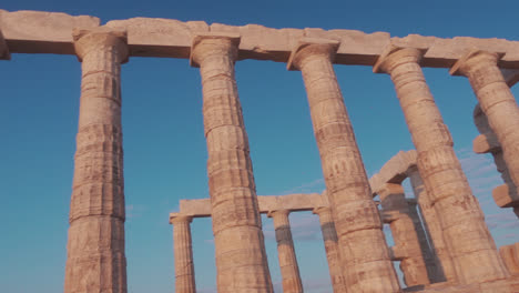 Ancient-ruins-in-Greece,-golden-from-the-sunset