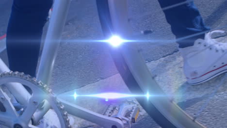 animación de puntos de luz sobre una mujer caminando en bicicleta
