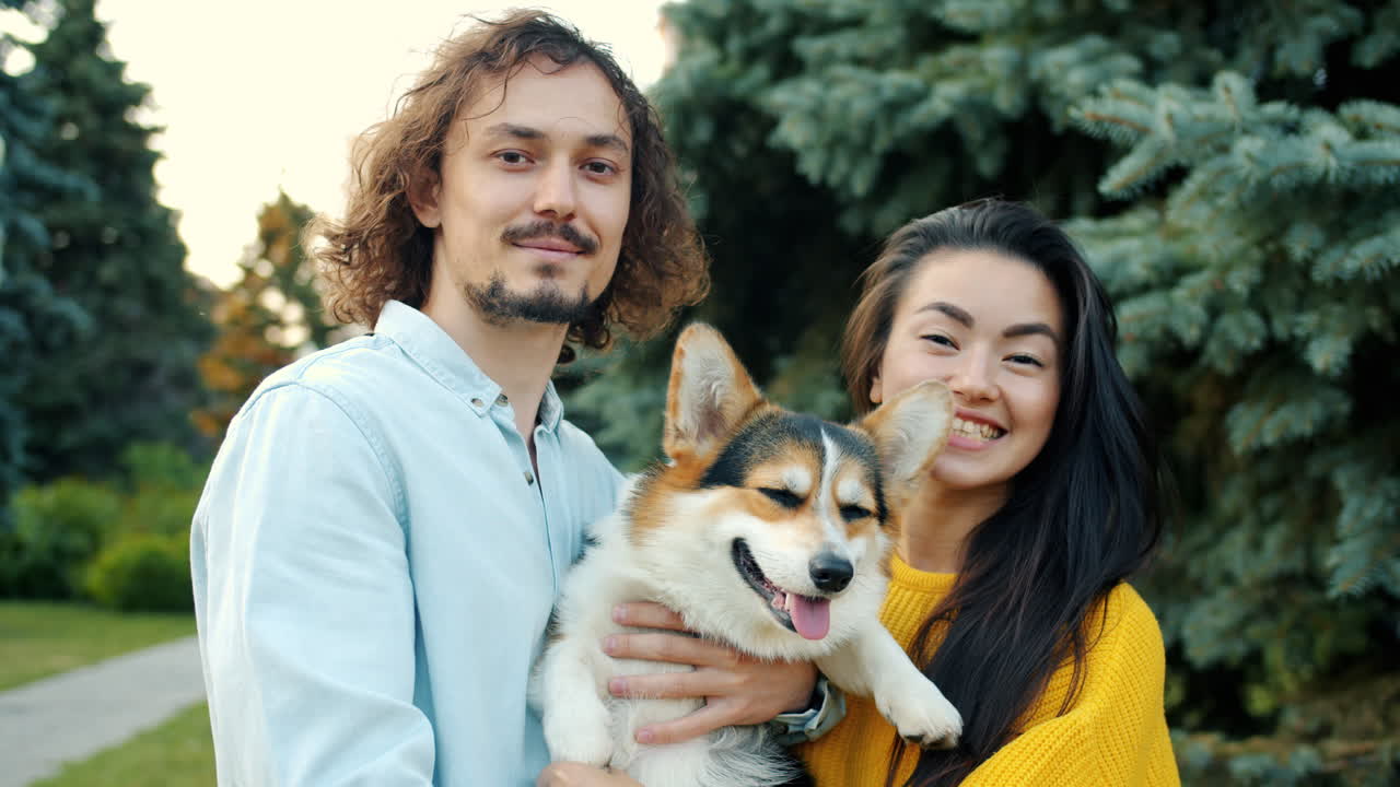 Couple with a corgi
