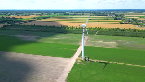 panoramic view of wind farm or wind park, with high wind turbines for generation electricity with copy space
