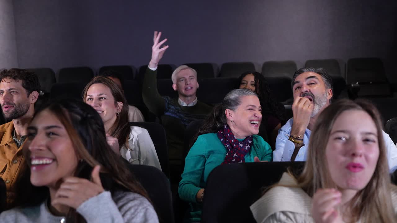 Enthusiastic Audience in a Movie Theater