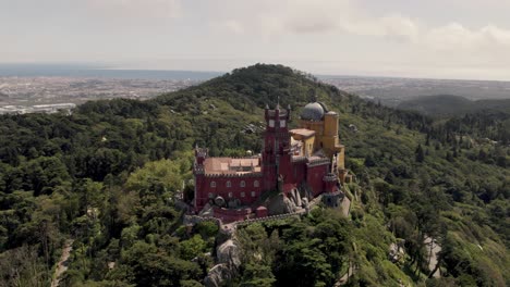 pena palace, hilltop castle in sintra mountains and forest, lisbon, portugal