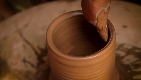 potter at work makes ceramic dishes. india, rajasthan.