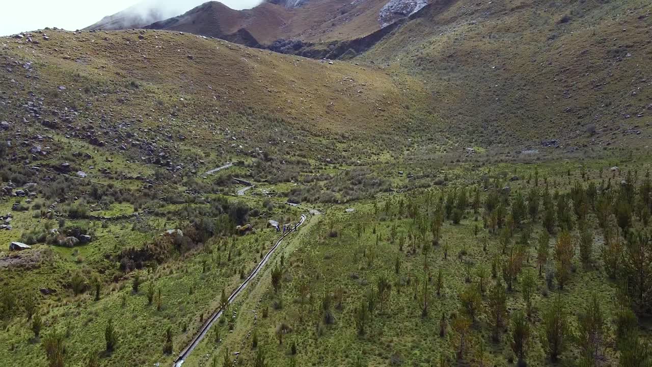 Aerial View Of Water Irrigation Running Through Fields By The Mountains In Huaraz, Peru.