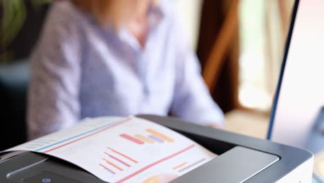 Woman printing graphs