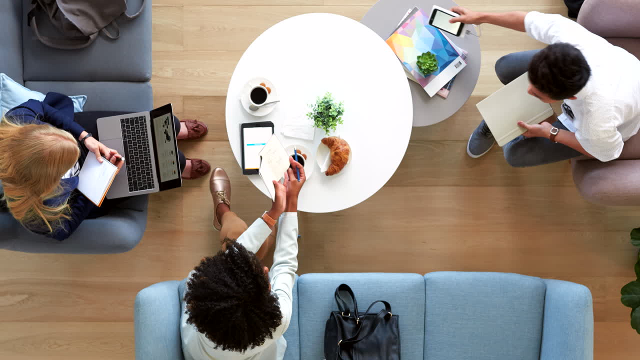 Teamwork at startup, meeting on sofa
