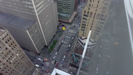 aerial birds eye overhead top down view of tall office of apartment buildings