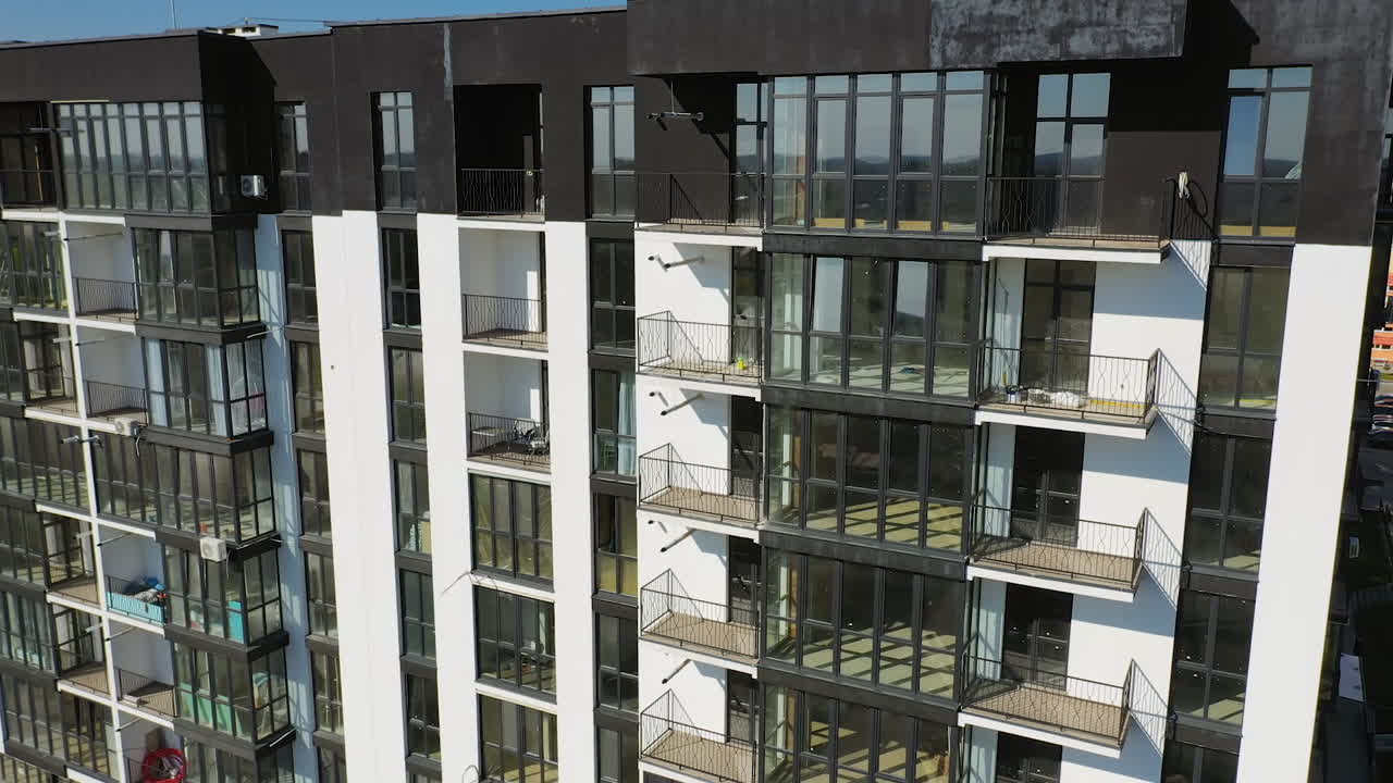 Drone view of new building townhouses. Modern residental apartments exterior.