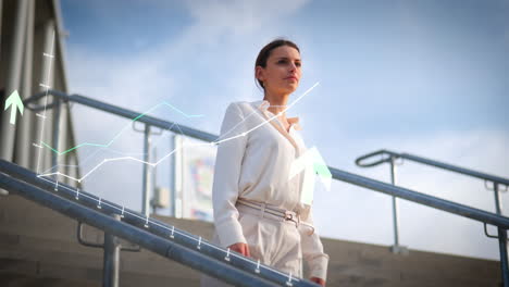 Confident-young-businesswoman-in-front-of-blue-sky-on-steps-of-business-building-with-digital-superimposed-positive-data-graphs-and-finances