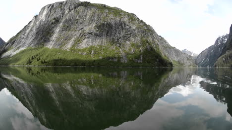 POV-boat-ride-cruising-through-a-glassy-waters-in-Fords-Terror-in-Tracy-ArmFords-Terror-Wilderness-Area-Southeast-Alaska