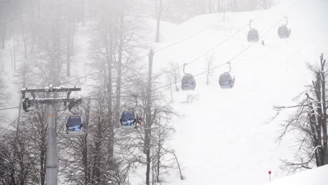 ski lift in snowy mountain landscape