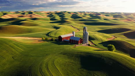 aerial view of a farm and rolling green fields in the palouse