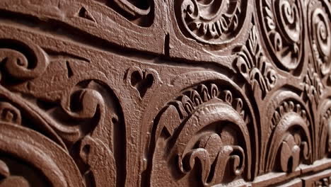 close-up view of ornate brown relief carving