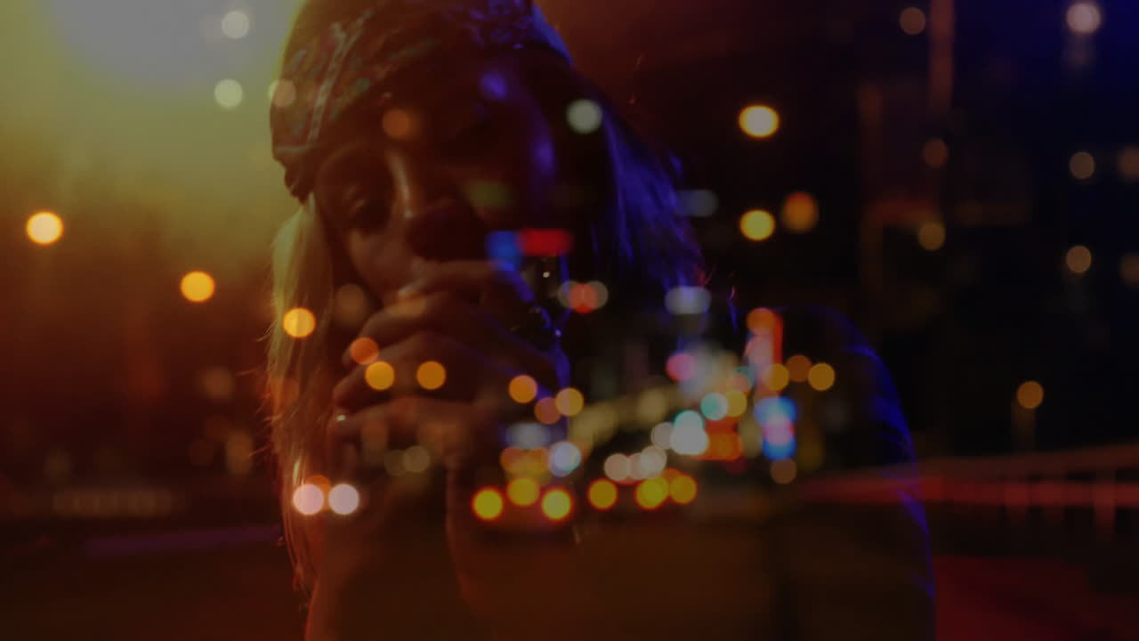 City lights animation over person singing into microphone at night