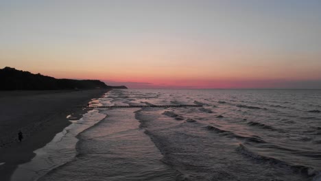 aerial: colorful beach sunset on beautiful baltic sea of east germany
