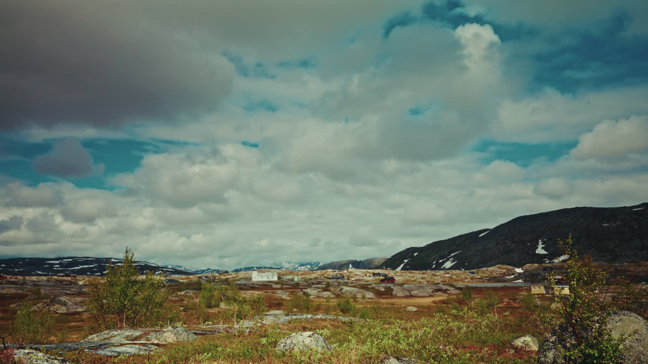 Traveling clouds time lapse in Bjornfjell, Norway. Vast Arctic tundra. Rugged landscape.