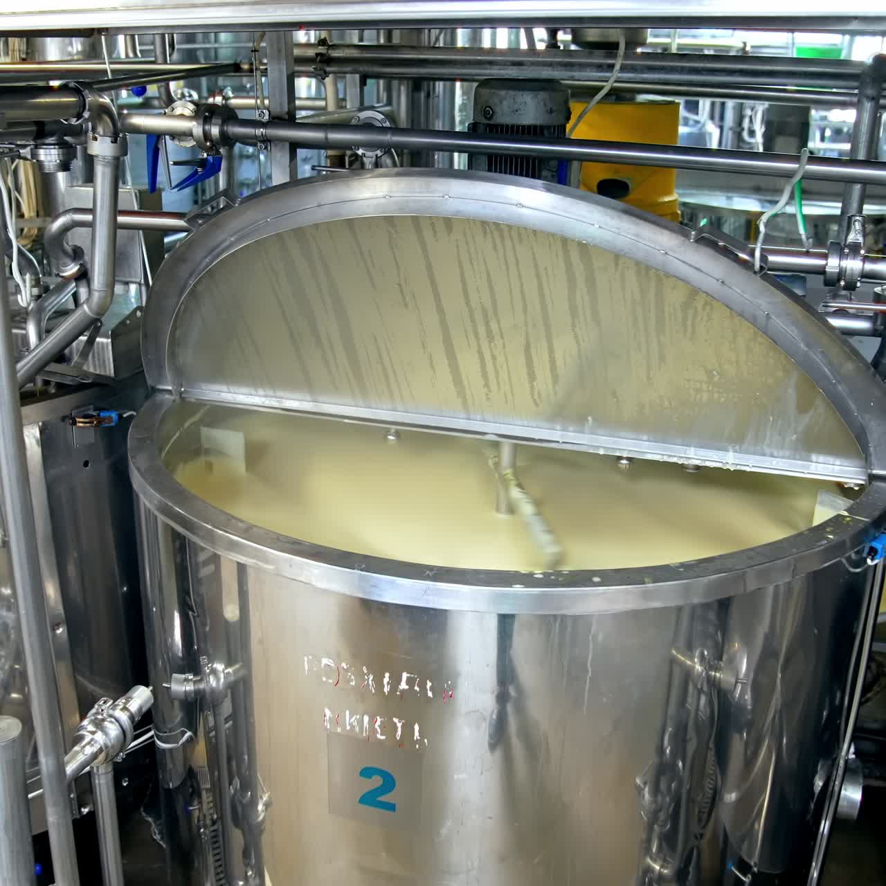 Production of butter at dairy plant. Butter production at dairy food industrial line