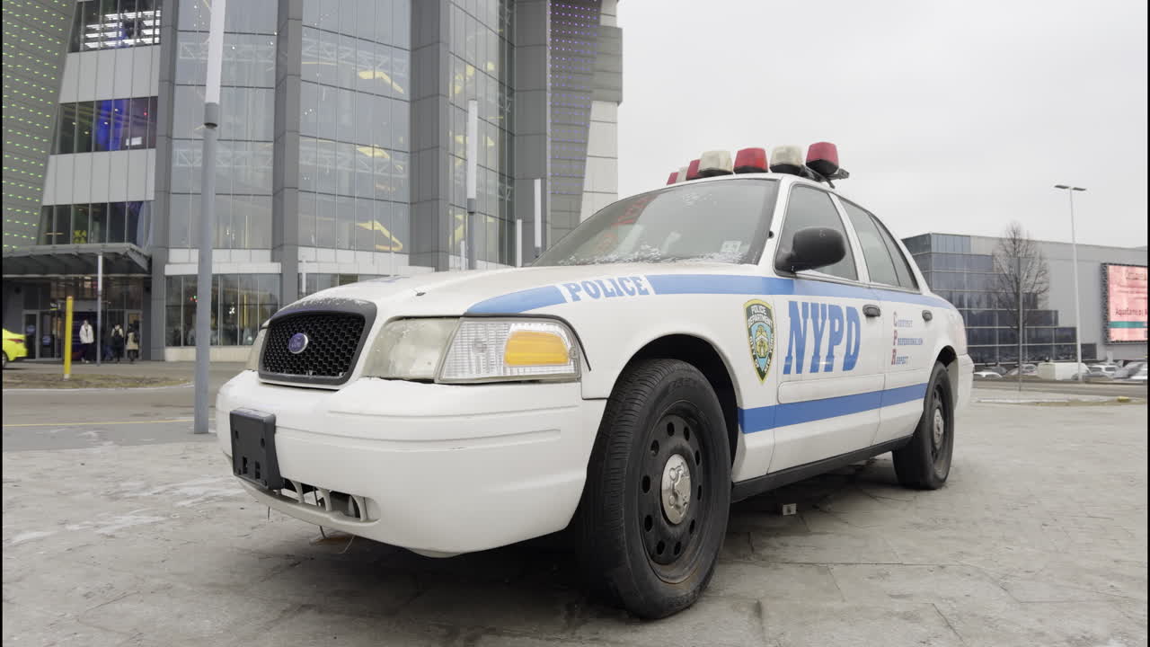 NYPD Police Car in Front of a Shopping Mall