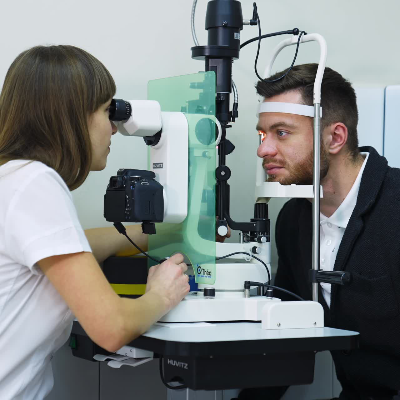 Checking eyesight of young man