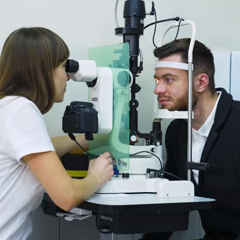 checking eyesight of young man