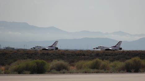 fighter jets taxi in the desert