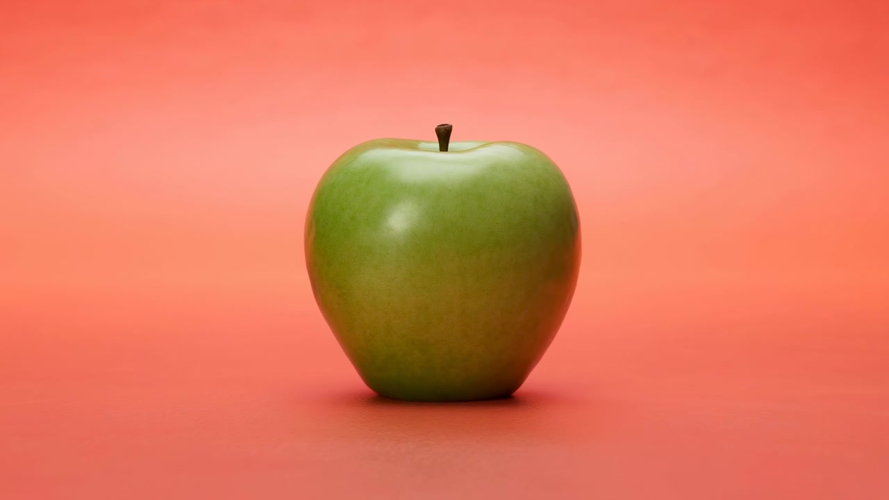Green Apple On Coral Backdrop, Studio Macro Closeup Showcasing Glossy Skin, Single Stem Centered, Crisp