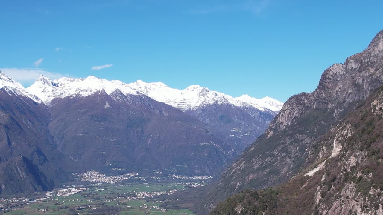Stunning aerial view of the Alps in Italy showcasing snow-capped peaks