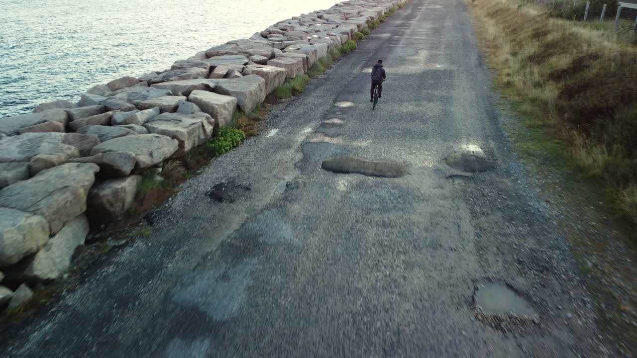 Cyclist on a Coastal Path