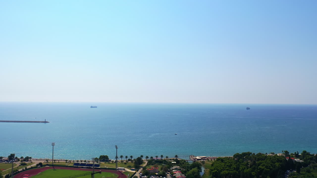 Approaching the waterscape from the seashore. Beautiful panorama of Adriatic sea at the coast of Montenegro.