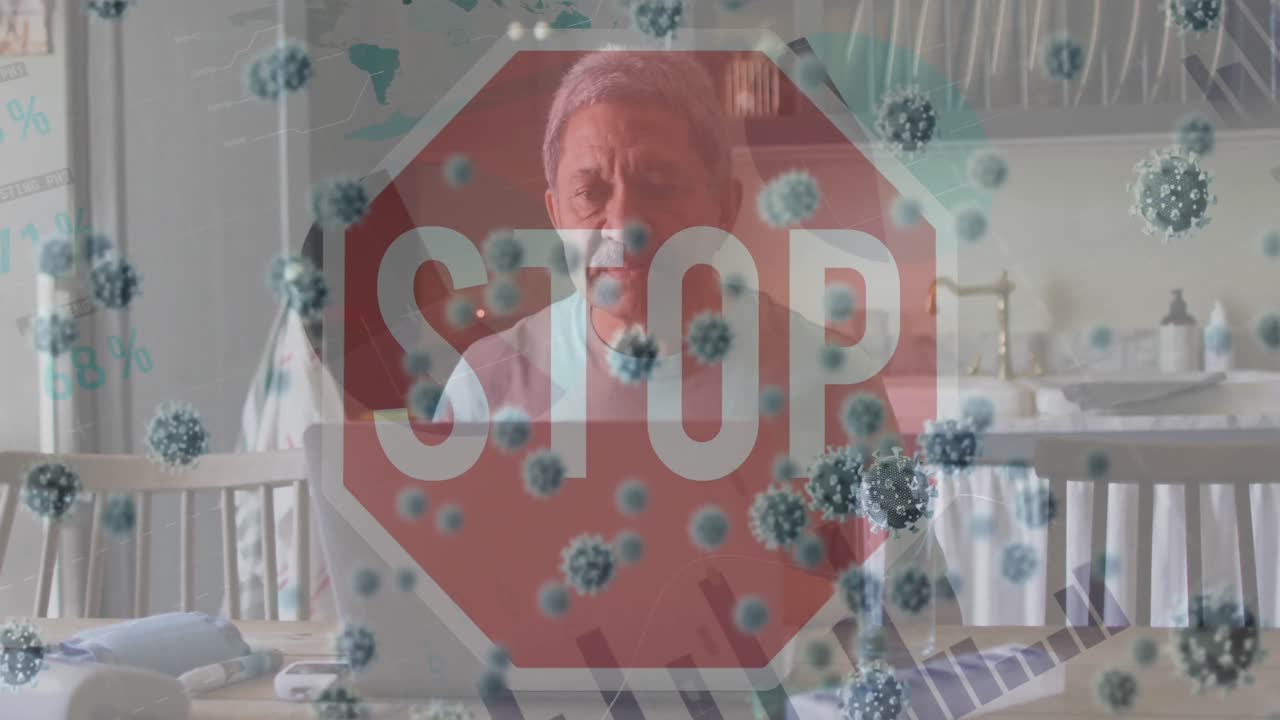 Animation of stop sign and virus cells over sad biracial man using laptop at home