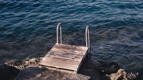 Wooden platform at the edge of the sea