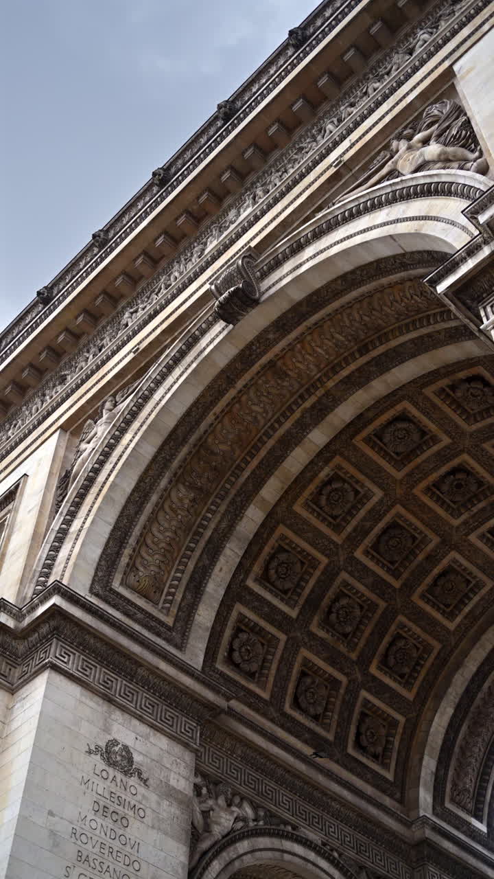 Close up view Of The Arc De Triomphe. Vertical, Paris, France