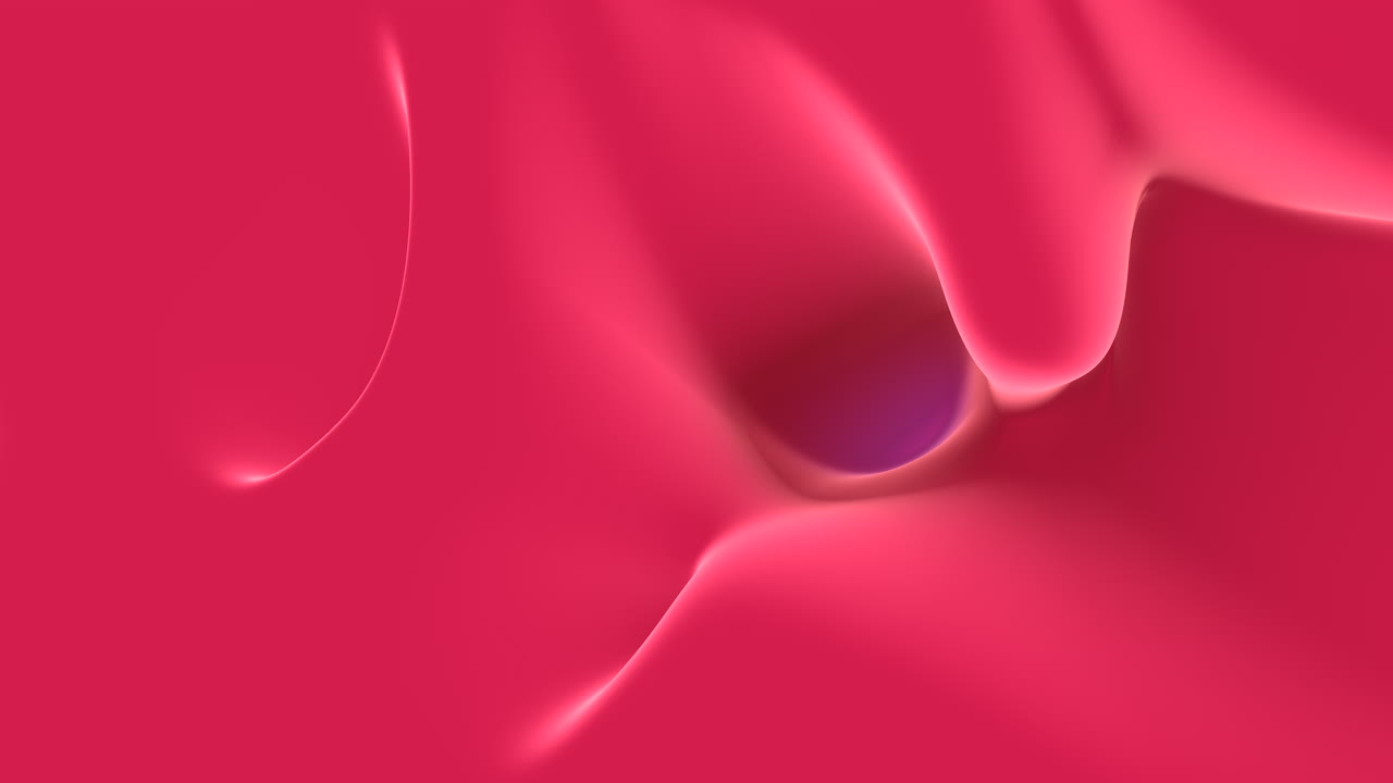 Close-up view of a red liquid pouring out of a bottle, illustrating vibrant color and fluid motion