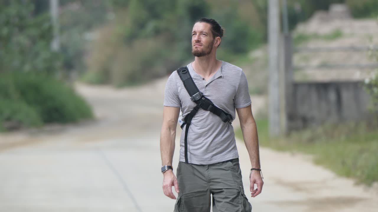 slow motion athletic tourist walking and enjoying the scenery in Koh Samui