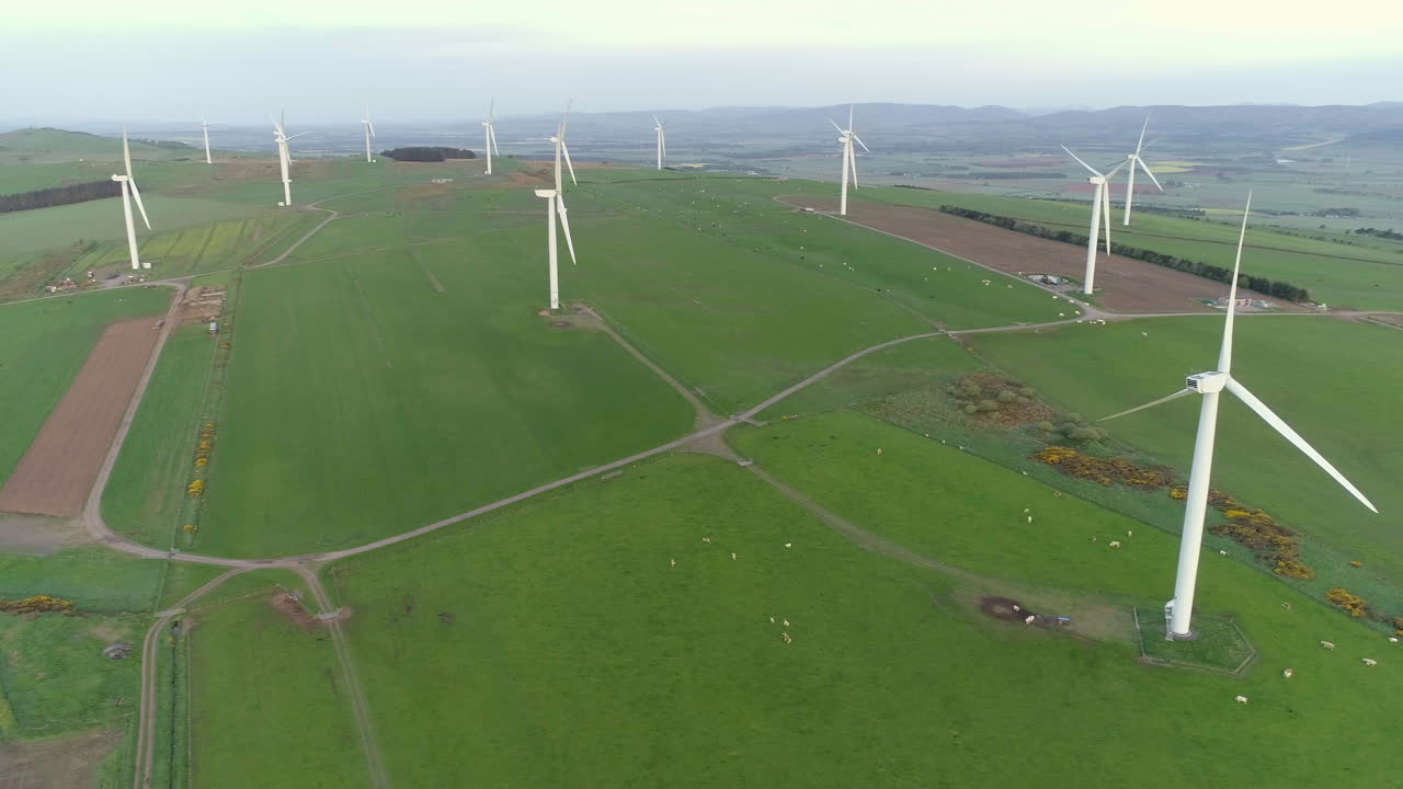 Aerial footage of the a wind turbine farm in Scotland