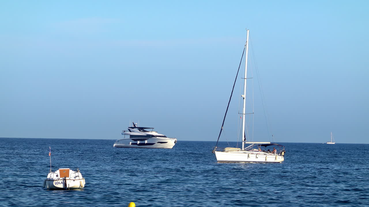 Boats moving on the sea in Golfe-Juan, France in daylight