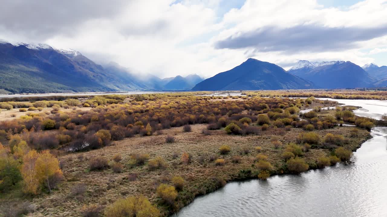 Aerial footage captures Glenorchy's serene river and mountain landscape under soft, diffused lighting