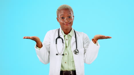 Hands,-black-doctor-and-woman-on-a-blue-studio