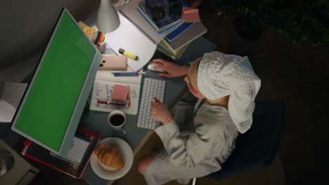 Involved-freelancer-typing-mockup-computer-closeup.-Woman-writing-notes-at-home