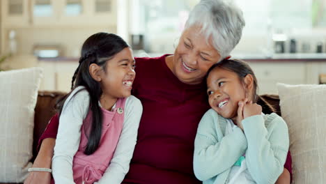 love, grandmother and children hug on sofa