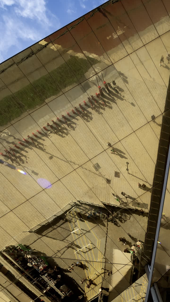 Timelapse of the encants second hand market with gloden reflecting roof in barcelona in vertical