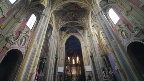 interior of the beautiful cathedral with long columns. cathedral of the assumption of the blessed virgin mary. camera moves to the ceiling.