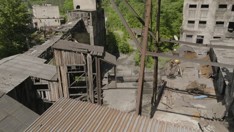 Rusty-sheet-metal-sheds-and-skywalk-bridge-in-abandoned-factory