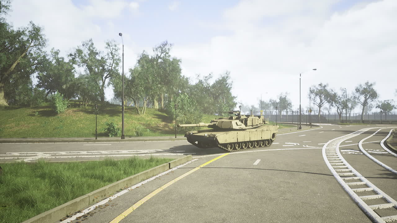 Military tank navigating a winding road in a scenic park landscape