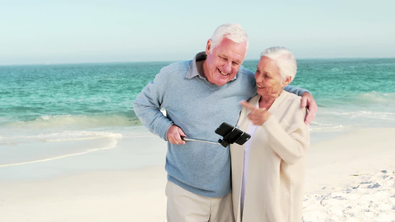 Retired old couple taking selfie